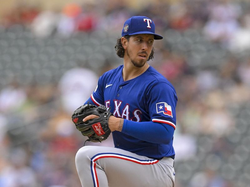 May 25, 2024; Minneapolis, Minnesota, USA;  Texas Rangers pitcher Michael Lorenzen (23) delivers a pitch against the Minnesota Twins during the first inning at Target Field. Mandatory Credit: Nick Wosika-USA TODAY Sports