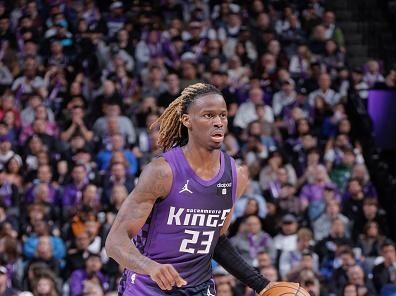 SACRAMENTO, CA - DECEMBER 22:  Keon Ellis #23 of the Sacramento Kings handles the ball during the game  on December 22, 2023 at Golden 1 Center in Sacramento, California. NOTE TO USER: User expressly acknowledges and agrees that, by downloading and or using this Photograph, user is consenting to the terms and conditions of the Getty Images License Agreement. Mandatory Copyright Notice: Copyright 2023 NBAE (Photo by Rocky Widner/NBAE via Getty Images)