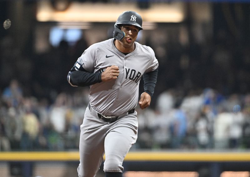 Apr 26, 2024; Milwaukee, Wisconsin, USA; New York Yankees outfielder Trent Grisham (12) rounds the bases after hitting a home run against the Milwaukee Brewers in the fourth inning at American Family Field. Mandatory Credit: Michael McLoone-USA TODAY Sports