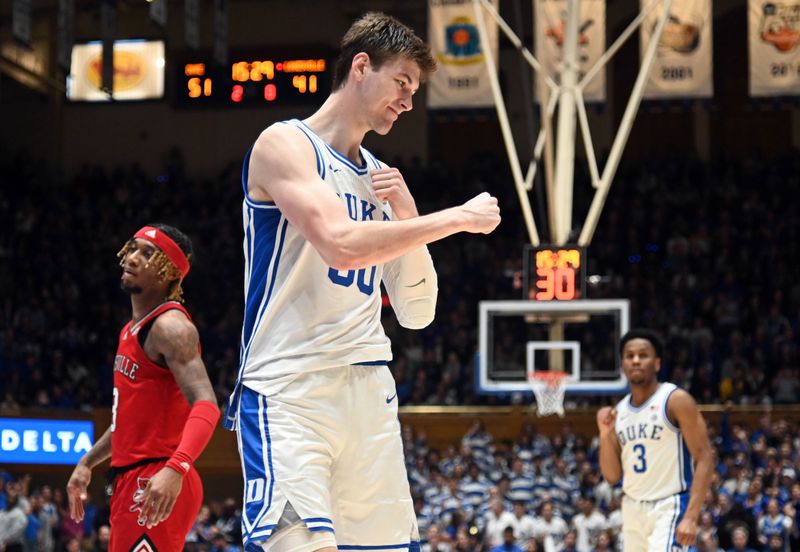 Feb 20, 2023; Durham, North Carolina, USA; Duke Blue Devils center Kyle Filipowski(30) reacts after scoring during the second half against the Louisville Cardinals at Cameron Indoor Stadium. The Blue Devils won 79-62. Mandatory Credit: Rob Kinnan-USA TODAY Sports