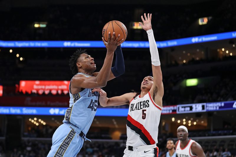 MEMPHIS, TENNESSEE - MARCH 02: GG Jackson #45 of the Memphis Grizzlies goes to the basket against Dalano Banton #5 of the Portland Trail Blazers during the first half at FedExForum on March 02, 2024 in Memphis, Tennessee. NOTE TO USER: User expressly acknowledges and agrees that, by downloading and or using this photograph, User is consenting to the terms and conditions of the Getty Images License Agreement. (Photo by Justin Ford/Getty Images)