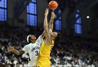 Can Michigan Wolverines Outmaneuver Penn State Nittany Lions at Target Center?