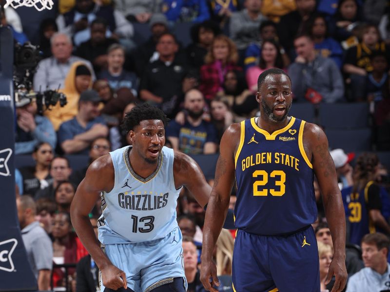 MEMPHIS, TN - FEBRUARY 2: Jaren Jackson Jr. #13 of the Memphis Grizzlies and Draymond Green #23 of the Golden State Warriors look on during the game on February 2, 2024 at FedExForum in Memphis, Tennessee. NOTE TO USER: User expressly acknowledges and agrees that, by downloading and or using this photograph, User is consenting to the terms and conditions of the Getty Images License Agreement. Mandatory Copyright Notice: Copyright 2024 NBAE (Photo by Joe Murphy/NBAE via Getty Images)