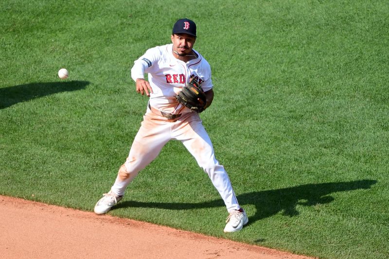 Jul 14, 2024; Boston, Massachusetts, USA;  Boston Red Sox shortstop Ceddanne Rafaela (43) throws to first for an out during the ninth inning against the Kansas City Royals at Fenway Park. Mandatory Credit: Bob DeChiara-USA TODAY Sports