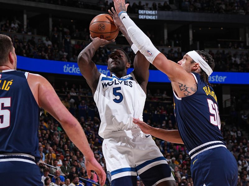 DENVER, CO - APRIL 10: Anthony Edwards #5 of the Minnesota Timberwolves shoots the ball during the game against the Denver Nuggets on April 10, 2024 at the Ball Arena in Denver, Colorado. NOTE TO USER: User expressly acknowledges and agrees that, by downloading and/or using this Photograph, user is consenting to the terms and conditions of the Getty Images License Agreement. Mandatory Copyright Notice: Copyright 2024 NBAE (Photo by Garrett Ellwood/NBAE via Getty Images)