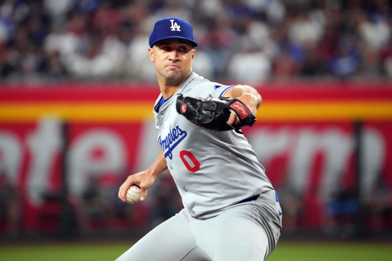 Sep 2, 2024; Phoenix, Arizona, USA; Los Angeles Dodgers pitcher Jack Flaherty (0) pitches against the Arizona Diamondbacks during the fourth inning at Chase Field. Mandatory Credit: Joe Camporeale-USA TODAY Sports