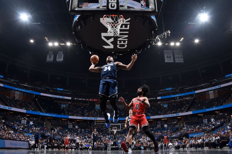 ORLANDO, FL - APRIL 7: Wendell Carter Jr. #34 of the Orlando Magic dunks the ball during the game against the Chicago Bulls on April 7, 2024 at the Kia Center in Orlando, Florida. NOTE TO USER: User expressly acknowledges and agrees that, by downloading and or using this photograph, User is consenting to the terms and conditions of the Getty Images License Agreement. Mandatory Copyright Notice: Copyright 2024 NBAE (Photo by Fernando Medina/NBAE via Getty Images)