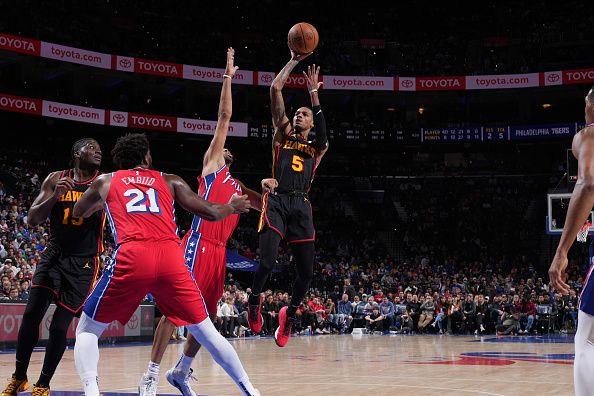 PHILADELPHIA, PA - DECEMBER 8: Dejounte Murray #5 of the Atlanta Hawks shoots the ball during the game against the Philadelphia 76ers on December 8, 2023 at the Wells Fargo Center in Philadelphia, Pennsylvania NOTE TO USER: User expressly acknowledges and agrees that, by downloading and/or using this Photograph, user is consenting to the terms and conditions of the Getty Images License Agreement. Mandatory Copyright Notice: Copyright 2023 NBAE (Photo by Jesse D. Garrabrant/NBAE via Getty Images)