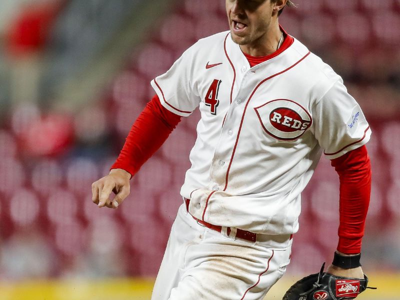 Apr 18, 2023; Cincinnati, Ohio, USA; Cincinnati Reds right fielder Wil Myers (4) tags first to get Tampa Bay Rays first baseman Luke Raley (not pictured) out in the ninth inning at Great American Ball Park. Mandatory Credit: Katie Stratman-USA TODAY Sports