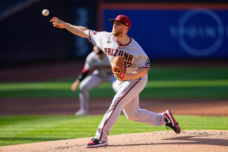 Sep 14, 2023; New York City, New York, USA; Arizona Diamondbacks pitcher Merrill Kelly (29) delivers a pitch agaimst the New York Mets during the first inning at Citi Field. Mandatory Credit: Gregory Fisher-USA TODAY Sports