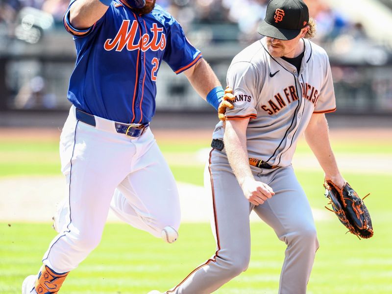 May 26, 2024; New York City, New York, USA;  San Francisco Giants starting pitcher Logan Webb (62) drops the ball allowing New York Mets right fielder DJ Stewart (29) to reach first base safely in the second inning at Citi Field. Mandatory Credit: Wendell Cruz-USA TODAY Sports