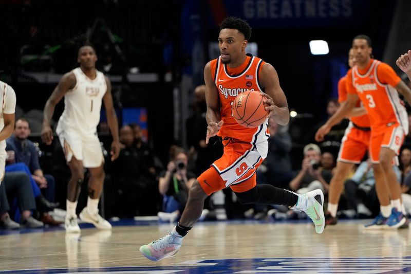 Mar 11, 2025; Charlotte, NC, USA; Syracuse Orange guard J.J. Starling (2) on the fast brake in the second half at Spectrum Center. Mandatory Credit: Bob Donnan-Imagn Images