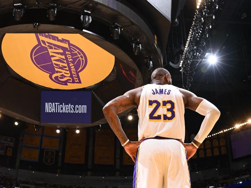 LOS ANGELES, CA - APRIL 27: LeBron James #23 of the Los Angeles Lakers looks on during the game against the Denver Nuggets during Round 1 Game 4 of the 2024 NBA Playoffs on April 27, 2024 at Crypto.Com Arena in Los Angeles, California. NOTE TO USER: User expressly acknowledges and agrees that, by downloading and/or using this Photograph, user is consenting to the terms and conditions of the Getty Images License Agreement. Mandatory Copyright Notice: Copyright 2024 NBAE (Photo by Andrew D. Bernstein/NBAE via Getty Images)