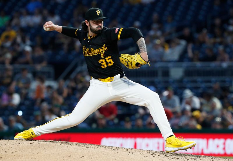 Jul 3, 2024; Pittsburgh, Pennsylvania, USA;  Pittsburgh Pirates relief pitcher Colin Holderman (35) pitches against the St. Louis Cardinals during the eighth inning at PNC Park. Mandatory Credit: Charles LeClaire-USA TODAY Sports