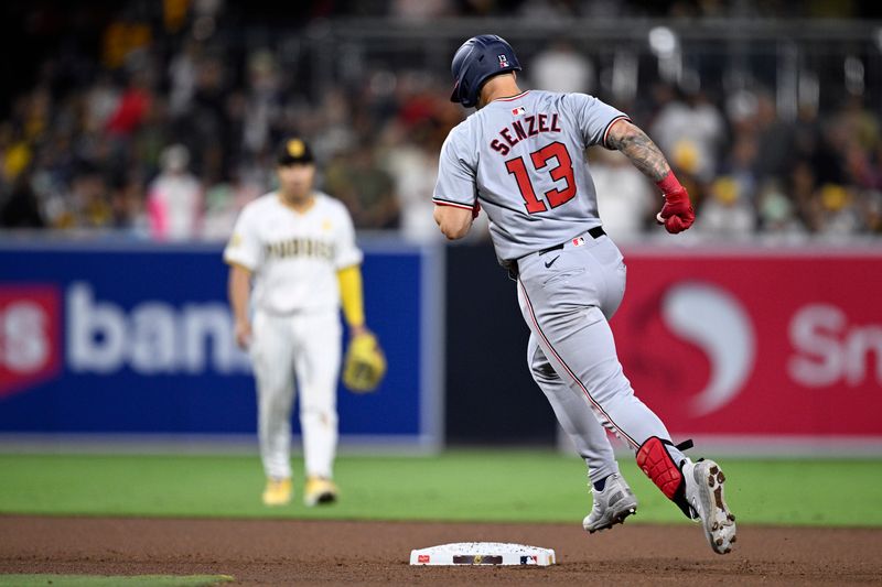 Jun 24, 2024; San Diego, California, USA; Washington Nationals third baseman Nick Senzel (13) rounds the bases after hitting a two-run home run against the San Diego Padres during the tenth inning at Petco Park. Mandatory Credit: Orlando Ramirez-USA TODAY Sports