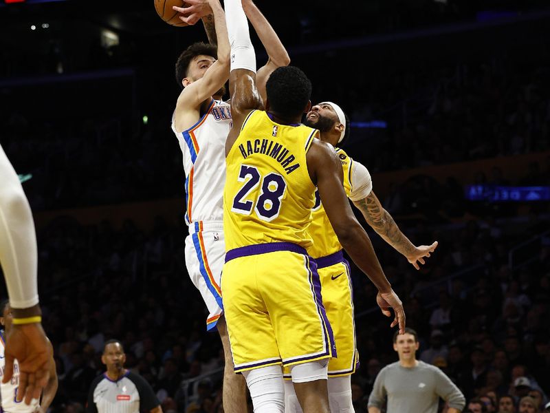 LOS ANGELES, CALIFORNIA - MARCH 04: Chet Holmgren #7 of the Oklahoma City Thunder takes a shot against Rui Hachimura #28 of the Los Angeles Lakers  in the second half at Crypto.com Arena on March 04, 2024 in Los Angeles, California.  NOTE TO USER: User expressly acknowledges and agrees that, by downloading and/or using this photograph, user is consenting to the terms and conditions of the Getty Images License Agreement.  (Photo by Ronald Martinez/Getty Images)