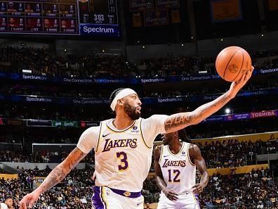 LOS ANGELES, CA - DECEMBER 2:  Anthony Davis #3 of the Los Angeles Lakers grabs the rebound during the game  on December 2, 2023 at Crypto.Com Arena in Los Angeles, California. NOTE TO USER: User expressly acknowledges and agrees that, by downloading and/or using this Photograph, user is consenting to the terms and conditions of the Getty Images License Agreement. Mandatory Copyright Notice: Copyright 2023 NBAE (Photo by Adam Pantozzi/NBAE via Getty Images)