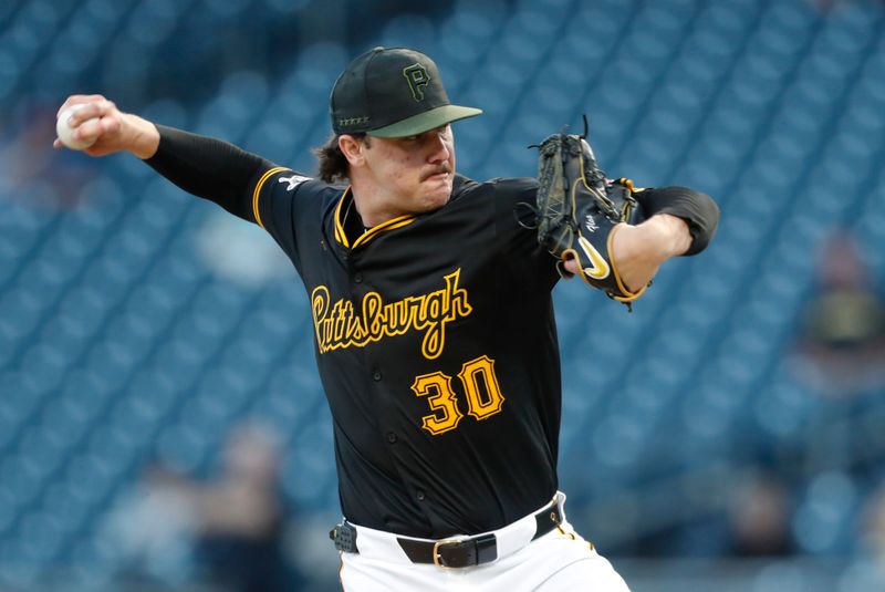 Sep 9, 2024; Pittsburgh, Pennsylvania, USA;  Pittsburgh Pirates starting pitcher Paul Skenes (30) pitches against the Miami Marlins during the first inning at PNC Park. Mandatory Credit: Charles LeClaire-Imagn Images