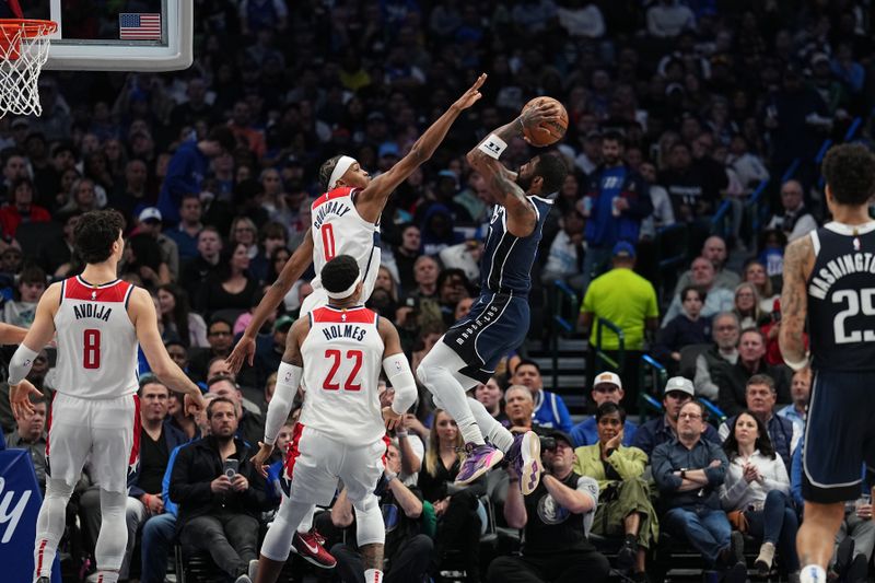 DALLAS, TX - FEBRUARY 12: Kyrie Irving #11 of the Dallas Mavericks drives to the basket during the game against the Washington Wizards on February 12, 2024 at the American Airlines Center in Dallas, Texas. NOTE TO USER: User expressly acknowledges and agrees that, by downloading and or using this photograph, User is consenting to the terms and conditions of the Getty Images License Agreement. Mandatory Copyright Notice: Copyright 2024 NBAE (Photo by Glenn James/NBAE via Getty Images)