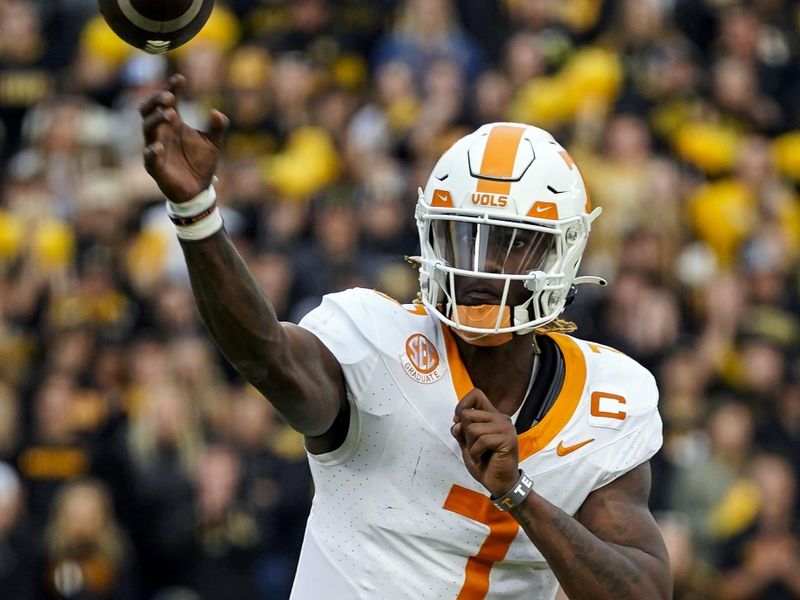 Nov 11, 2023; Columbia, Missouri, USA; Tennessee Volunteers quarterback Joe Milton III (7) throws a pass during the second half against the Missouri Tigers at Faurot Field at Memorial Stadium. Mandatory Credit: Jay Biggerstaff-USA TODAY Sports