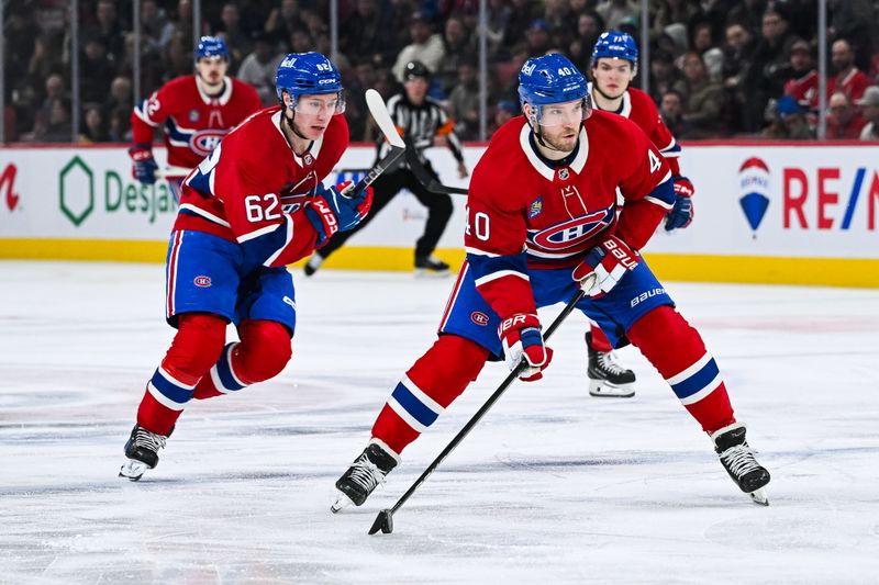 Jan 21, 2025; Montreal, Quebec, CAN; Montreal Canadiens right wing Joel Armia (40) plays the puck against the Tampa Bay Lightning during the third period at Bell Centre. Mandatory Credit: David Kirouac-Imagn Images