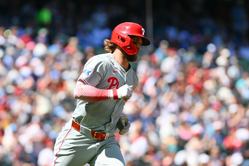 Aug 4, 2024; Seattle, Washington, USA; Philadelphia Phillies first baseman Bryce Harper (3) runs towards first base after hitting a single against the Seattle Mariners during the fourth inning at T-Mobile Park. Mandatory Credit: Steven Bisig-USA TODAY Sports
