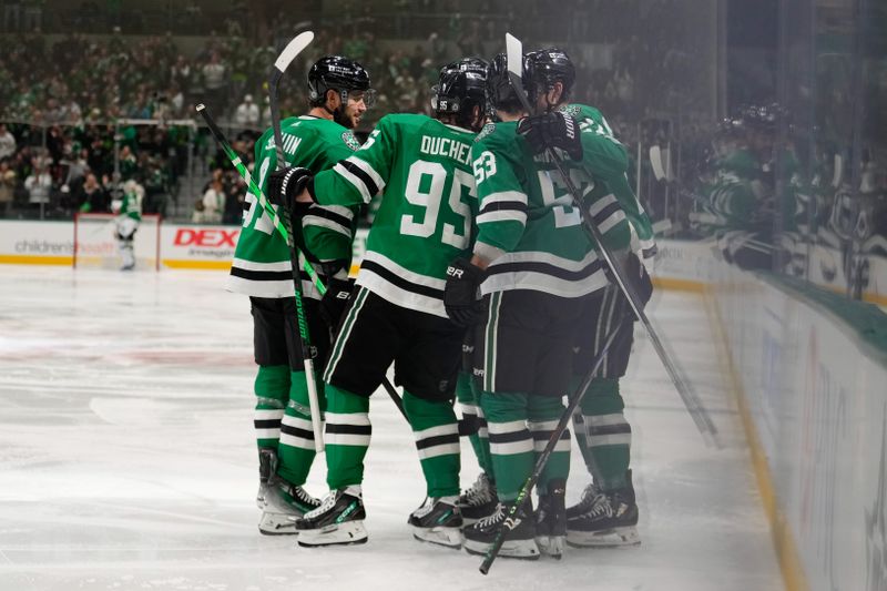 Feb 17, 2024; Dallas, Texas, USA; Dallas Stars center Wyatt Johnston (53) celebrates with teammates after scoring a goal against the Edmonton Oilers during the second period at American Airlines Center. Mandatory Credit: Chris Jones-USA TODAY Sports