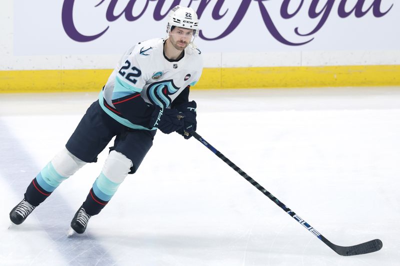 Jan 16, 2025; Winnipeg, Manitoba, CAN; Seattle Kraken right wing Oliver Bjorkstrand (22) warms up before a game against the Winnipeg Jets at Canada Life Centre. Mandatory Credit: James Carey Lauder-Imagn Images