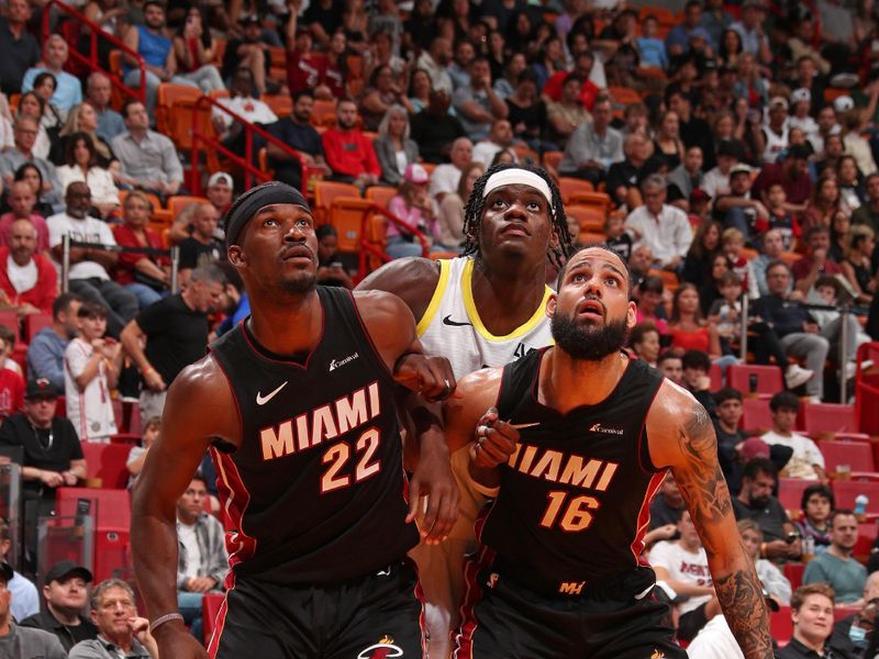 MIAMI, FL - MARCH 2: Jimmy Butler #22 and Caleb Martin #16 of the Miami Heat box out during the game against the Utah Jazz on March 2, 2024 at Kaseya Center in Miami, Florida. NOTE TO USER: User expressly acknowledges and agrees that, by downloading and or using this Photograph, user is consenting to the terms and conditions of the Getty Images License Agreement. Mandatory Copyright Notice: Copyright 2024 NBAE (Photo by Issac Baldizon/NBAE via Getty Images)