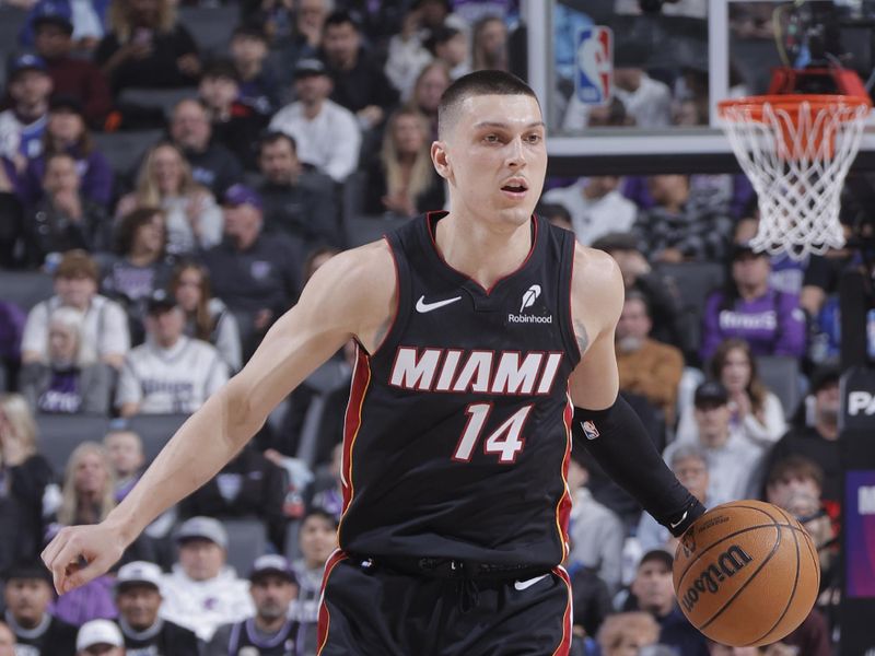 SACRAMENTO, CA - JANUARY 6: Tyler Herro #14 of the Miami Heat dribbles the ball during the game against the Sacramento Kings on January 6, 2025 at Golden 1 Center in Sacramento, California. NOTE TO USER: User expressly acknowledges and agrees that, by downloading and or using this Photograph, user is consenting to the terms and conditions of the Getty Images License Agreement. Mandatory Copyright Notice: Copyright 2025 NBAE (Photo by Rocky Widner/NBAE via Getty Images)