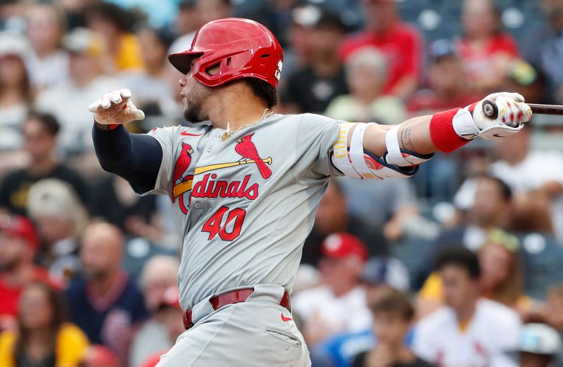 Jul 2, 2024; Pittsburgh, Pennsylvania, USA;  St. Louis Cardinals catcher Willson Contreras (40) hits a single against the Pittsburgh Pirates during the fourth inning at PNC Park. Mandatory Credit: Charles LeClaire-USA TODAY Sports