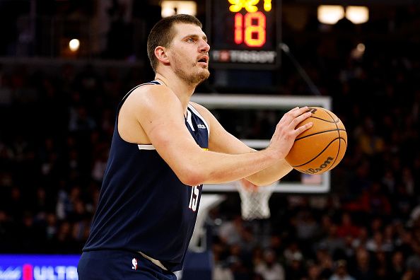 MINNEAPOLIS, MINNESOTA - NOVEMBER 01: Nikola Jokic #15 of the Denver Nuggets shoots the ball against the Minnesota Timberwolves in the third quarter at Target Center on November 01, 2023 in Minneapolis, Minnesota. The Timberwolves defeated the Nuggets 110-89. NOTE TO USER: User expressly acknowledges and agrees that, by downloading and or using this photograph, User is consenting to the terms and conditions of the Getty Images License Agreement. (Photo by David Berding/Getty Images)