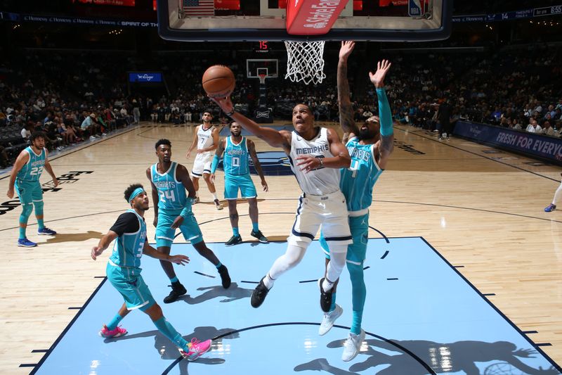 MEMPHIS, TN - OCTOBER 10: Desmond Bane #22 of the Memphis Grizzlies shoots the ball during the game against the Charlotte Hornets during a NBA Preseason game on October 10, 2024 at FedExForum in Memphis, Tennessee. NOTE TO USER: User expressly acknowledges and agrees that, by downloading and or using this photograph, User is consenting to the terms and conditions of the Getty Images License Agreement. Mandatory Copyright Notice: Copyright 2024 NBAE (Photo by Joe Murphy/NBAE via Getty Images)