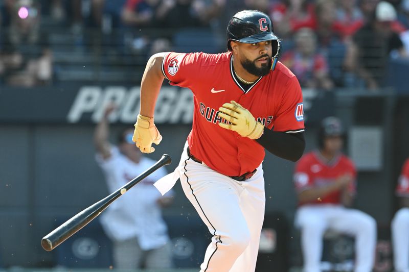 Sep 28, 2025; Cleveland, Ohio, USA;  Cleveland Guardians right fielder Johnathan Rodriguez (30) hits an RBI single during the first inning against the Texas Rangers at Progressive Field. Mandatory Credit: Ken Blaze-Imagn Images