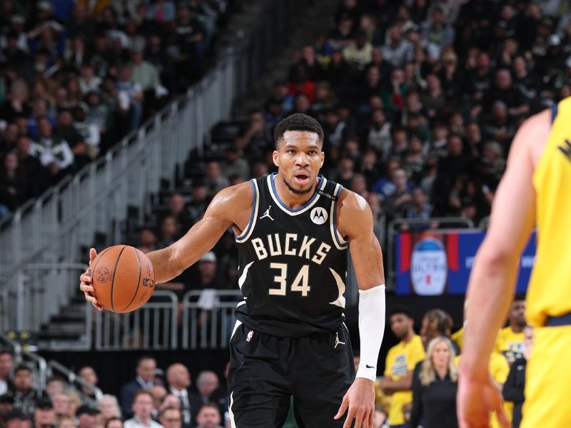 MILWAUKEE, WI - APRIL 27: Giannis Antetokounmpo #34 of the Milwaukee Bucks handles the ball during the game against the Indiana Pacers during Round One Game Four of the 2025 NBA Playoffs on April 27, 2025 at Fiserv Forum Center in Milwaukee, Wisconsin. NOTE TO USER: User expressly acknowledges and agrees that, by downloading and or using this Photograph, user is consenting to the terms and conditions of the Getty Images License Agreement. Mandatory Copyright Notice: Copyright 2025 NBAE (Photo by Jeff Haynes/NBAE via Getty Images).
