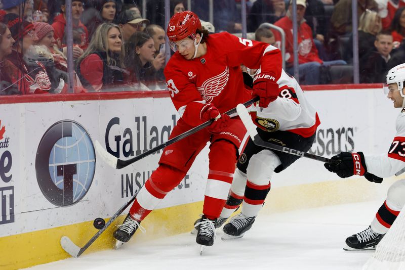 Jan 7, 2025; Detroit, Michigan, USA; Detroit Red Wings defenseman Moritz Seider (53) skates with the puck in the third period against the Ottawa Senators at Little Caesars Arena. Mandatory Credit: Rick Osentoski-Imagn Images