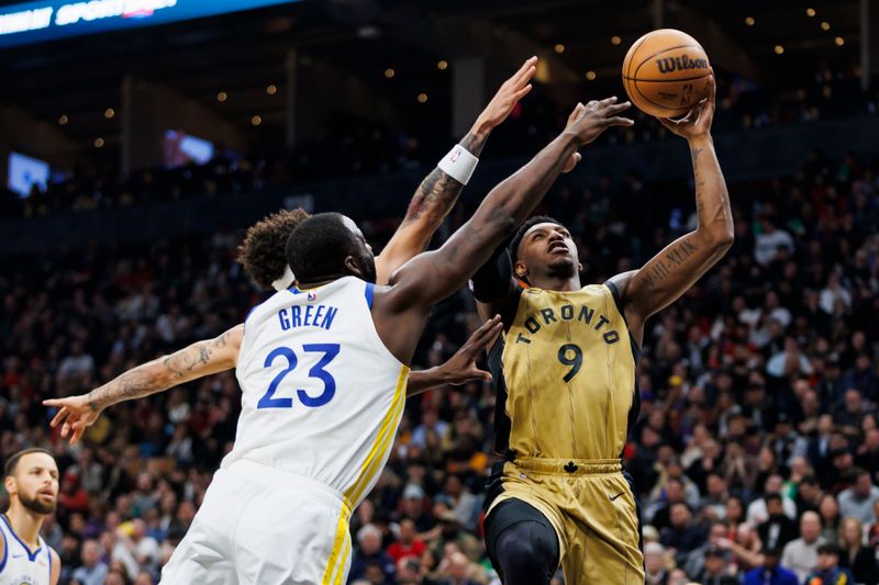 TORONTO, CANADA - MARCH 1: RJ Barrett #9 of the Toronto Raptors drives against Draymond Green #23 of the Golden State Warriors in the first half of their NBA game at Scotiabank Arena on March 1, 2024 in Toronto, Canada.  NOTE TO USER: User expressly acknowledges and agrees that, by downloading and or using this photograph, User is consenting to the terms and conditions of the Getty Images License Agreement. (Photo by Cole Burston/Getty Images)