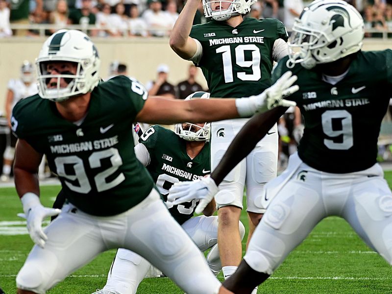 Sep 2, 2022; East Lansing, Michigan, USA; Michigan State Spartans place kicker Jack Stone (19) kicks an extra point at Spartan Stadium during their game against Western Michigan University. Mandatory Credit: Dale Young-USA TODAY Sports
