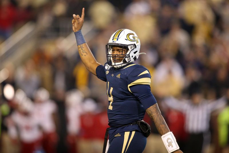 Nov 21, 2019; Atlanta, GA, USA; Georgia Tech Yellow Jackets quarterback James Graham (4) reacts in the first half against the North Carolina State Wolfpack at Bobby Dodd Stadium. Mandatory Credit: Brett Davis-USA TODAY Sports