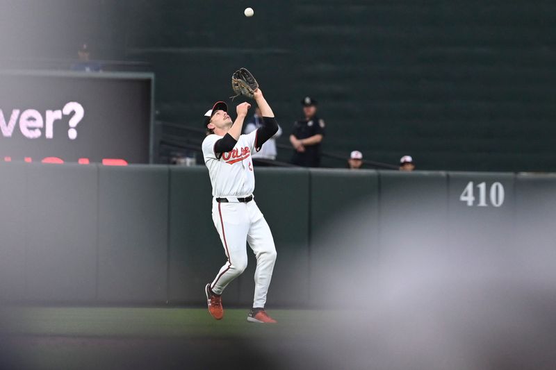 May 29, 2024; Baltimore, Maryland, USA;  Baltimore Orioles shortstop Gunnar Henderson (2) catches a second inning pop fly against the Boston Red Sox at Oriole Park at Camden Yards. Mandatory Credit: Tommy Gilligan-USA TODAY Sports