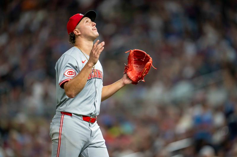 Sep 13, 2024; Minneapolis, Minnesota, USA; Cincinnati Reds starting pitcher Julian Aguiar (39) walks off the field after getting pulled for a relief pitcher in the seventh inning against the Minnesota Twins at Target Field. Mandatory Credit: Jesse Johnson-Imagn Images