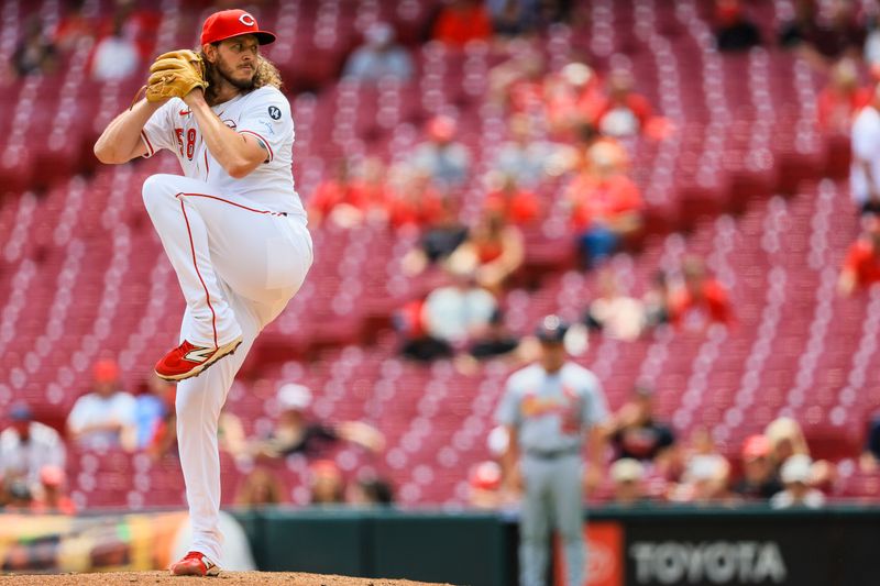 Apr 30, 2025; Cincinnati, Ohio, USA; Cincinnati Reds relief pitcher Scott Barlow (58) pitches against the St. Louis Cardinals in the eighth inning at Great American Ball Park. Mandatory Credit: Katie Stratman-Imagn Images