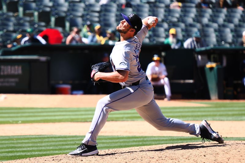 May 23, 2024; Oakland, California, USA; Colorado Rockies relief pitcher Peter Lambert (20) pitches the ball against the Oakland Athletics during the eleventh inning at Oakland-Alameda County Coliseum. Mandatory Credit: Kelley L Cox-USA TODAY Sports