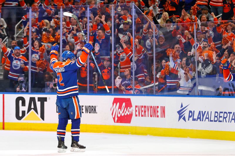 May 18, 2024; Edmonton, Alberta, CAN; Edmonton Oilers defensemen Evan Bouchard (2) celebrates after scoring a goal against the Vancouver Canucks during the second period against the Vancouver Canucks in game six of the second round of the 2024 Stanley Cup Playoffs at Rogers Place. Mandatory Credit: Perry Nelson-USA TODAY Sports