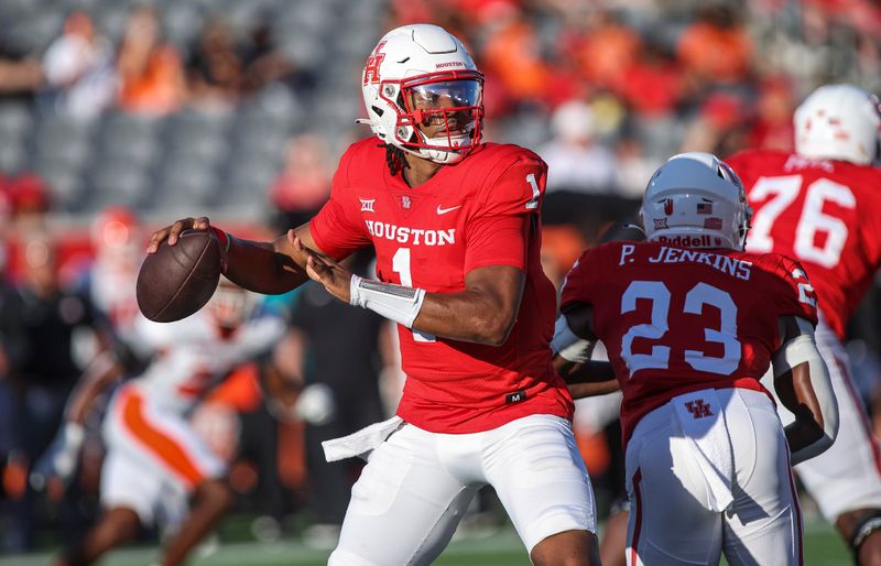 Sep 23, 2023; Houston, Texas, USA; Houston Cougars quarterback Donovan Smith (1) attempts a pass during the first quarter against the Sam Houston State Bearkats at TDECU Stadium. Mandatory Credit: Troy Taormina-USA TODAY Sports