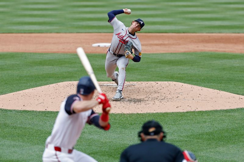 Jun 9, 2024; Washington, District of Columbia, USA; Atlanta Braves starting pitcher Hurston Waldrep (30) pitches against Washington Nationals center fielder Jacob Young (30) during the third inning at Nationals Park. Mandatory Credit: Geoff Burke-USA TODAY Sports