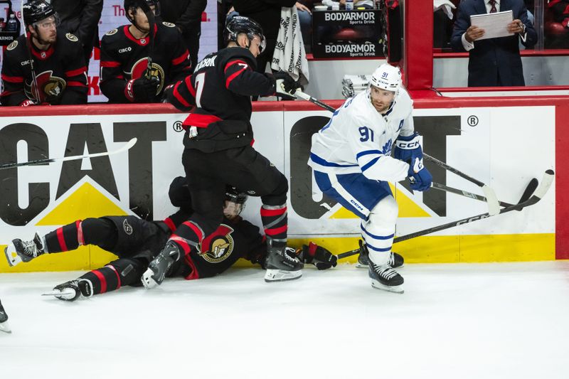 May 1, 2025; Ottawa, Ontario, CAN; Toronto Maple Leafs center John Tavares (91) skates off after evading a check by Ottawa Senators left wing Brady Tkachuk (7) in game six of the first round of the 2025 Stanley Cup Playoffs at Canadian Tire Centre. Mandatory Credit: Marc DesRosiers-Imagn Images