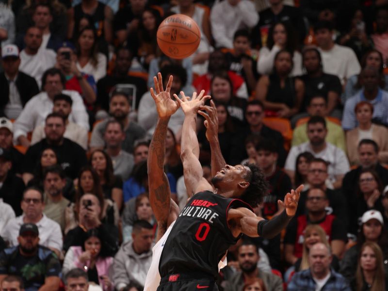 MIAMI, FL - FEBRUARY 4: Josh Richardson #0 of the Miami Heat rebounds the ball during the game against the LA Clippers on February 4, 2024 at Kaseya Center in Miami, Florida. NOTE TO USER: User expressly acknowledges and agrees that, by downloading and or using this Photograph, user is consenting to the terms and conditions of the Getty Images License Agreement. Mandatory Copyright Notice: Copyright 2024 NBAE (Photo by Issac Baldizon/NBAE via Getty Images)