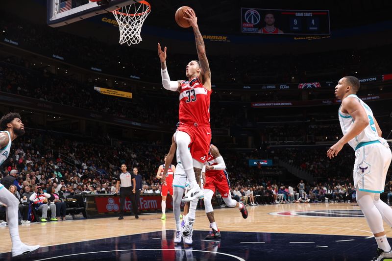 WASHINGTON, DC -? MARCH 8:  Kyle Kuzma #33 of the Washington Wizards goes to the basket during the game on March 8, 2024 at Capital One Arena in Washington, DC. NOTE TO USER: User expressly acknowledges and agrees that, by downloading and or using this Photograph, user is consenting to the terms and conditions of the Getty Images License Agreement. Mandatory Copyright Notice: Copyright 2024 NBAE (Photo by Stephen Gosling/NBAE via Getty Images)