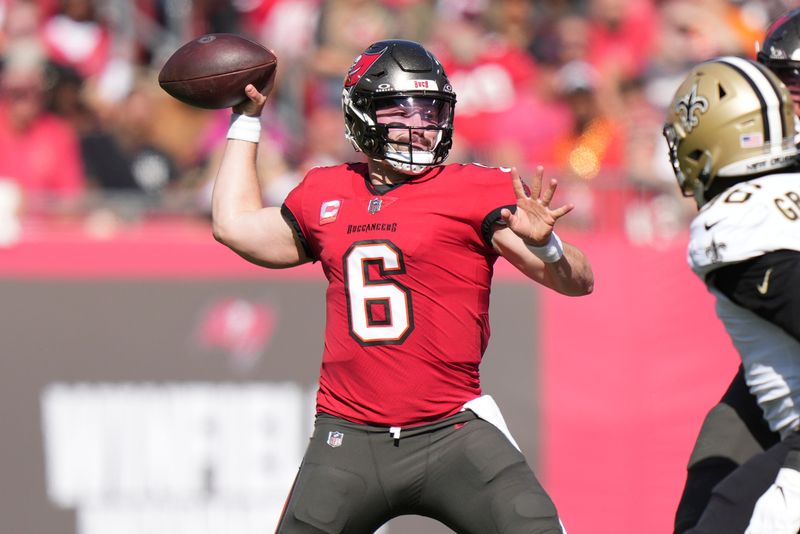 Tampa Bay Buccaneers quarterback Baker Mayfield (6) makes a pass attempt during an NFL football game against the New Orleans Saints, Sunday, Dec. 31, 2023, in Tampa, Fla. (AP Photo/Peter Joneleit)